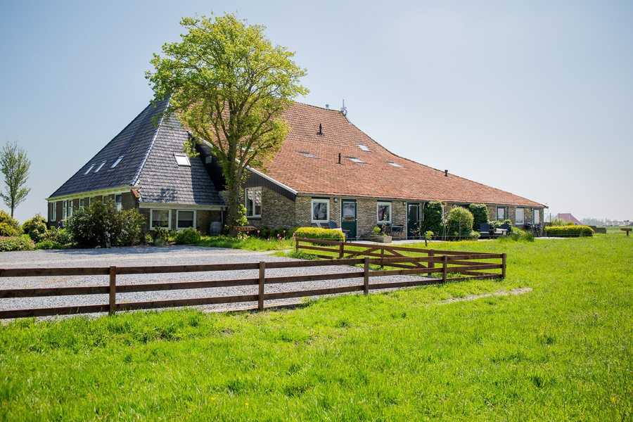 Modern apartments in old farmhouse, Frisian lake district