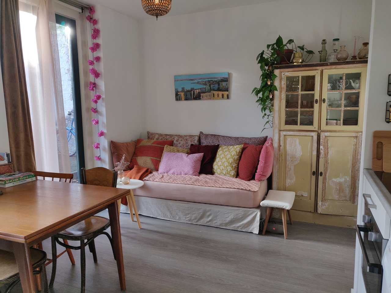 Cute little house in characteristic city center with green garden