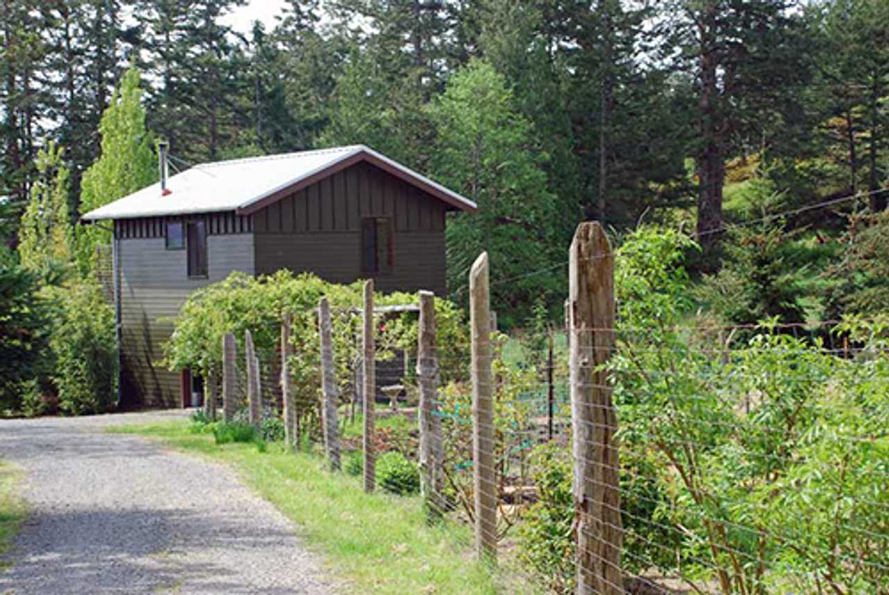 Waterfront Cottage on a organic farm and animal sanctuary.