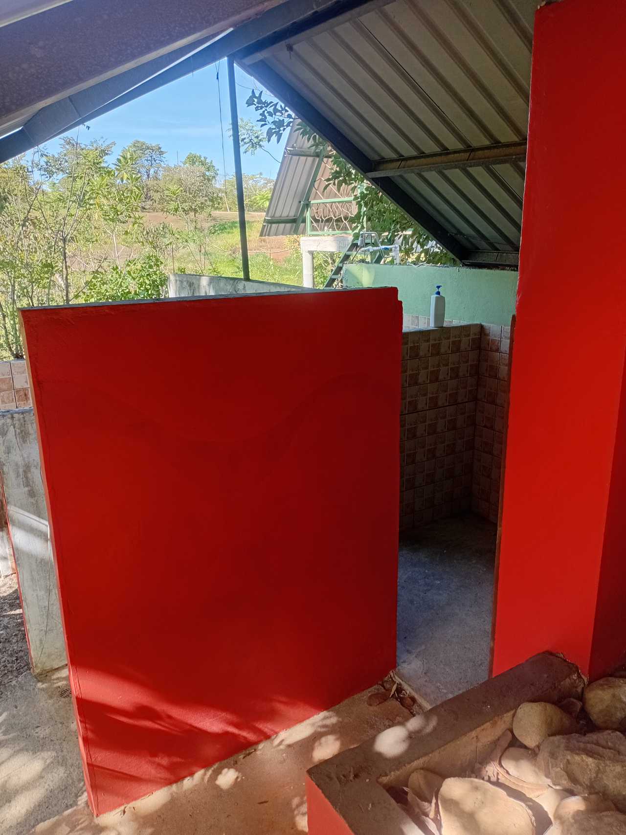 VERY BASIC quiet house near the beach. Open space and good view. Outside shower 