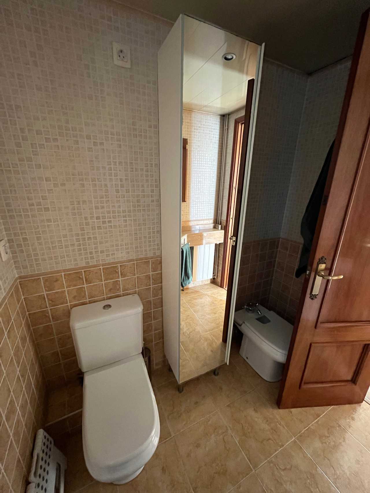 Comfortable double room with its own terrace and lovely views in an attic duplex