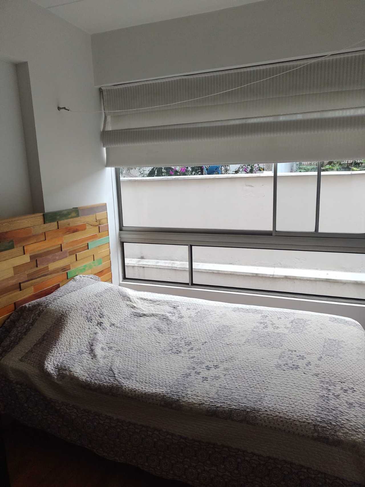 Bright room with dedicated bathroom in cozy home