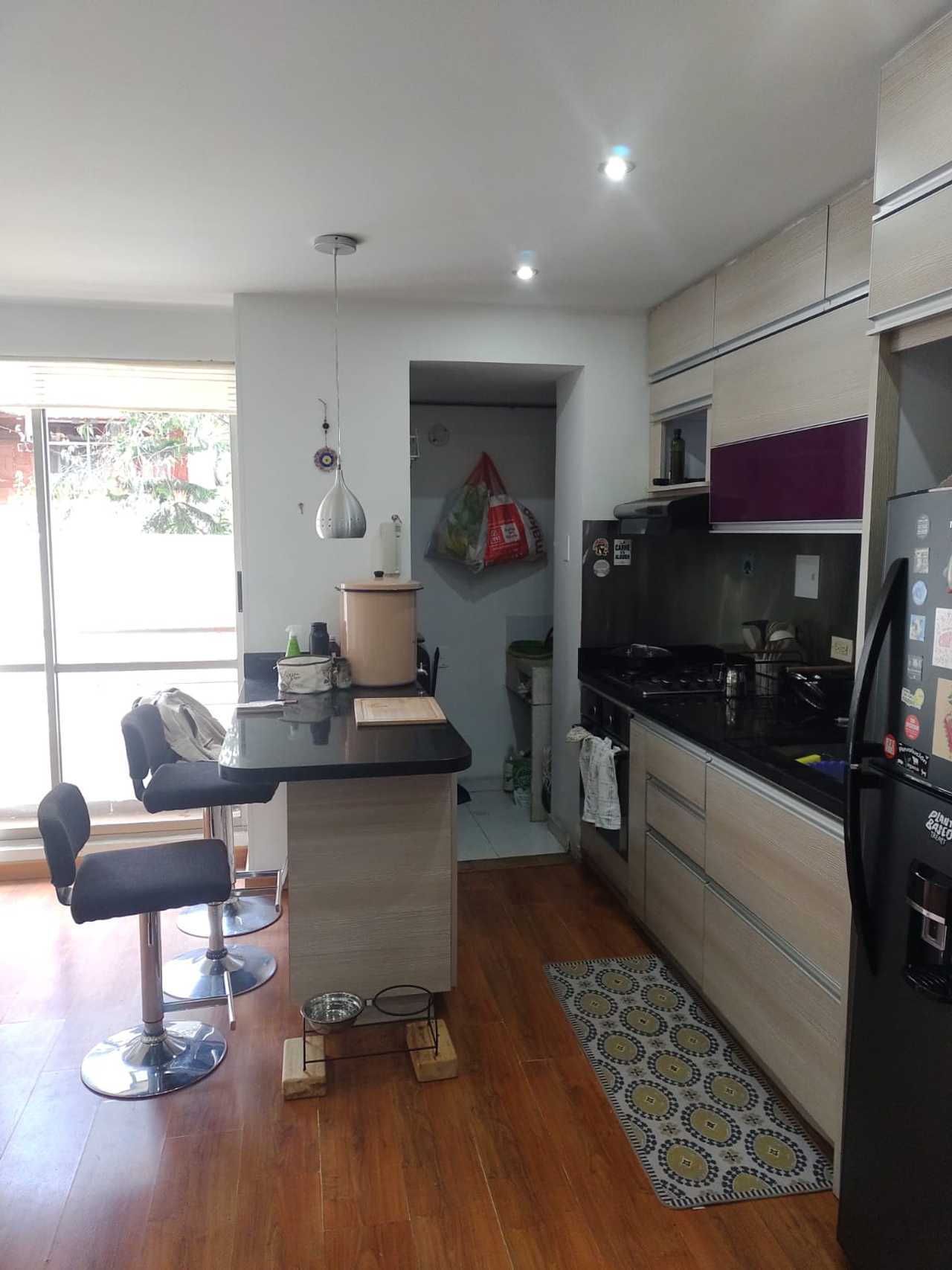 Bright room with dedicated bathroom in cozy home