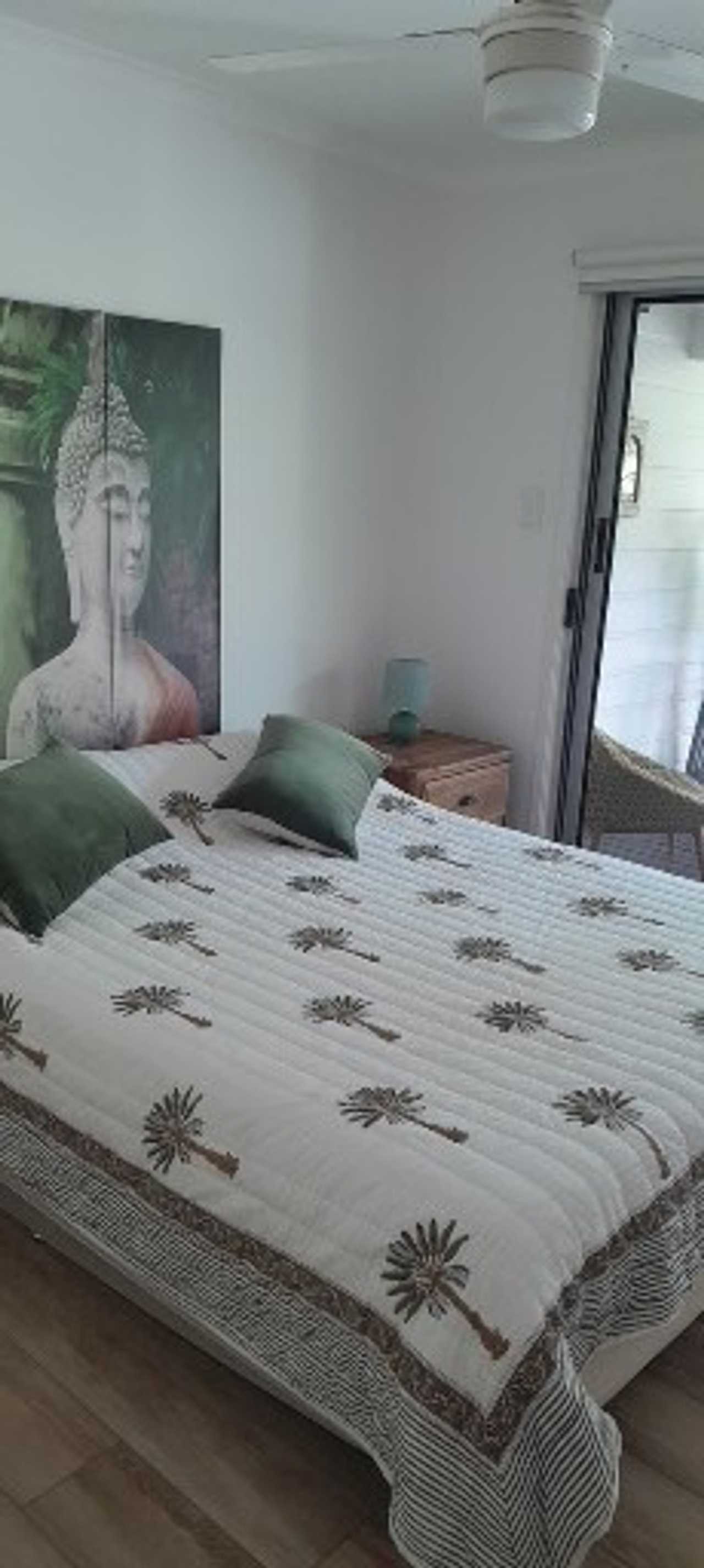 First floor room with balcony and Pacific ocean breeze in sought after location.