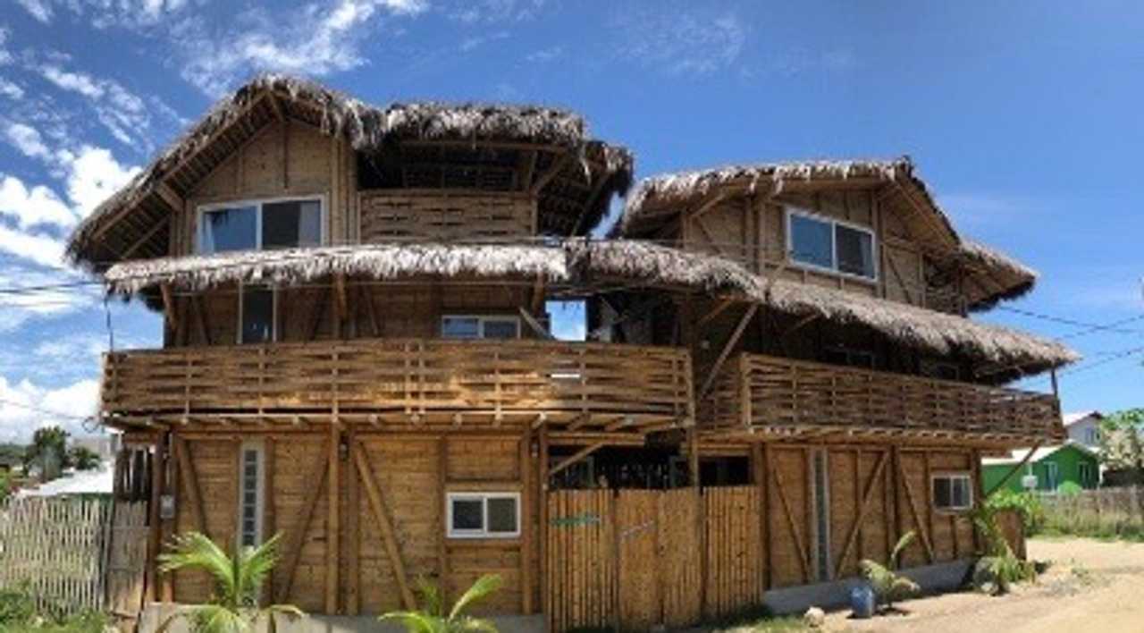 Bamboo Beach Houses w/ luxuries, hot baths, close in town, &surf right out front
