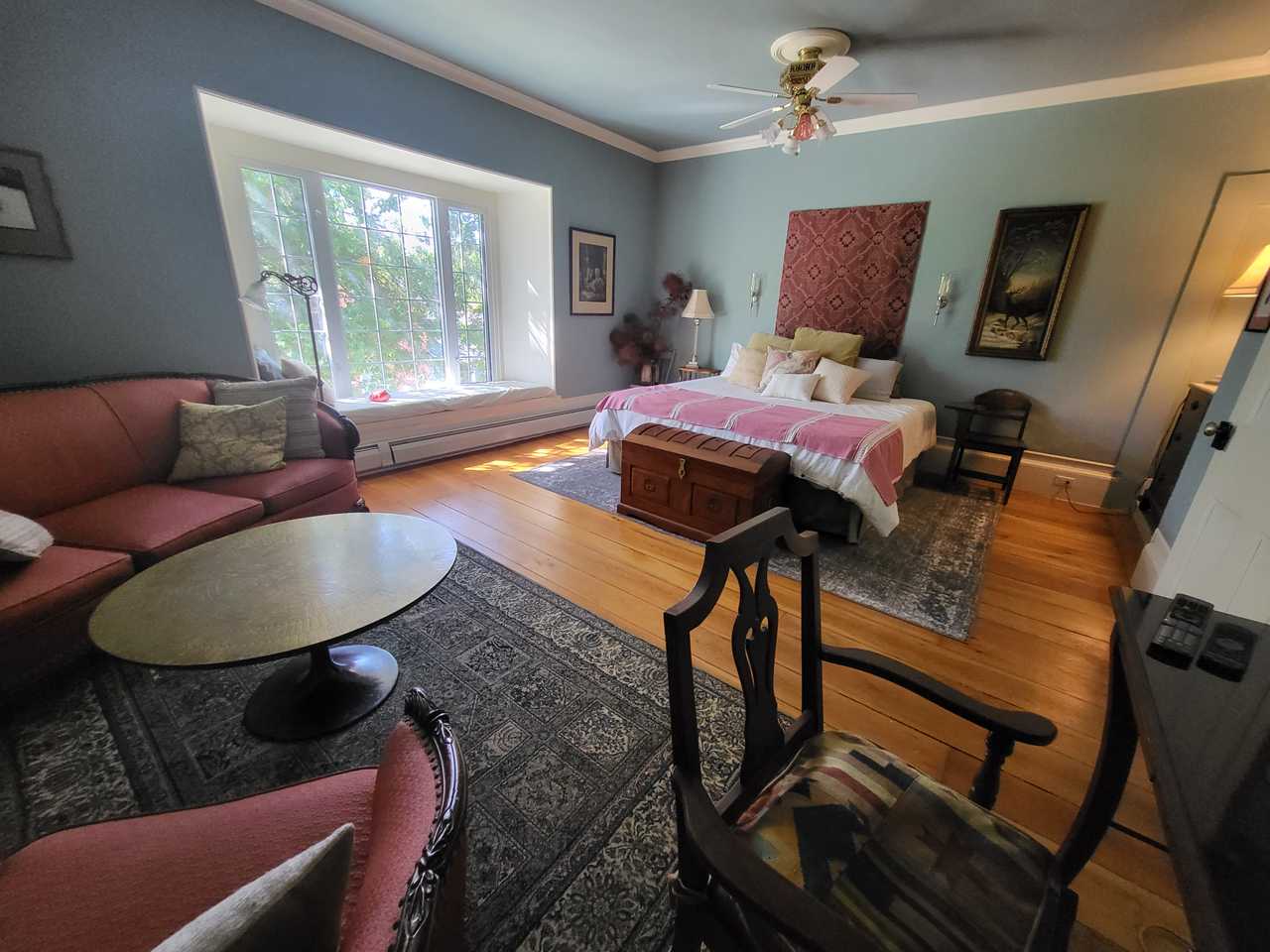 Beautiful King Bedroom with Large Gallery Wall and Art on the Ottawa River