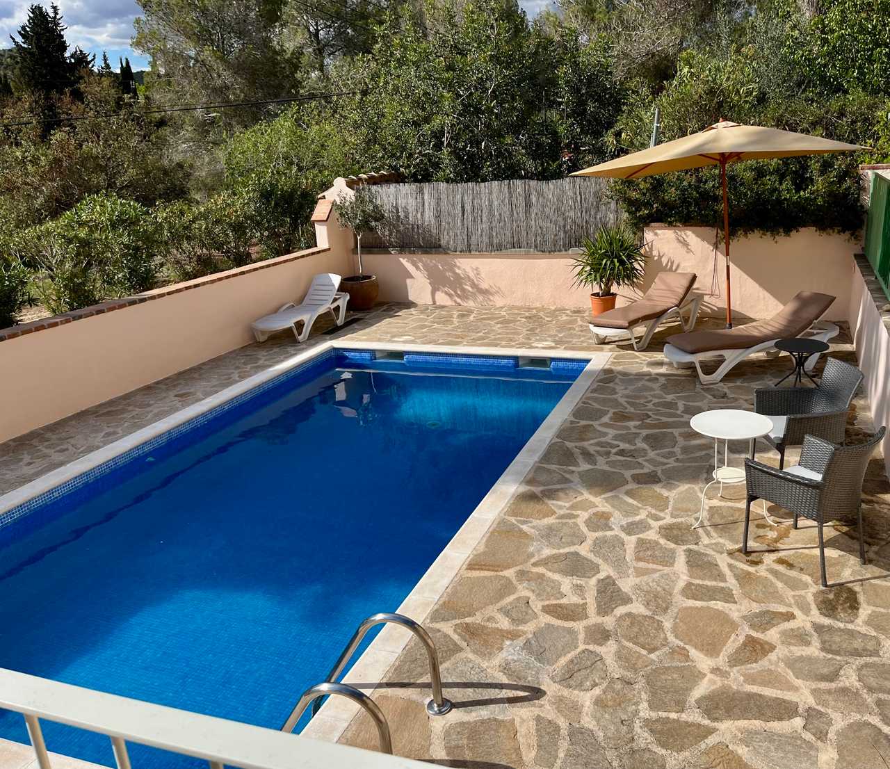 Apartment in country house with views and pool.