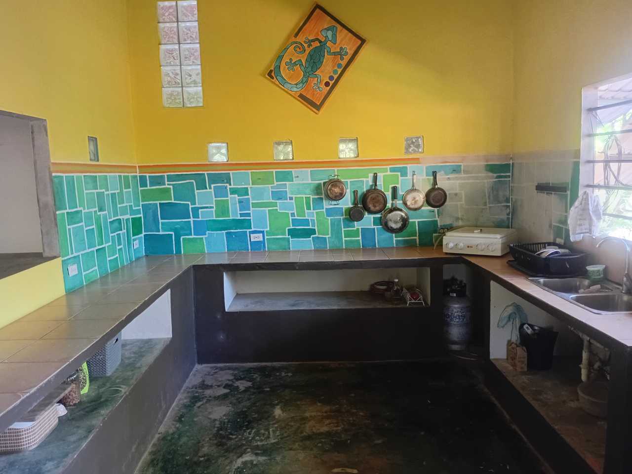 VERY BASIC quiet house near the beach. Open space and good view. Outside shower 