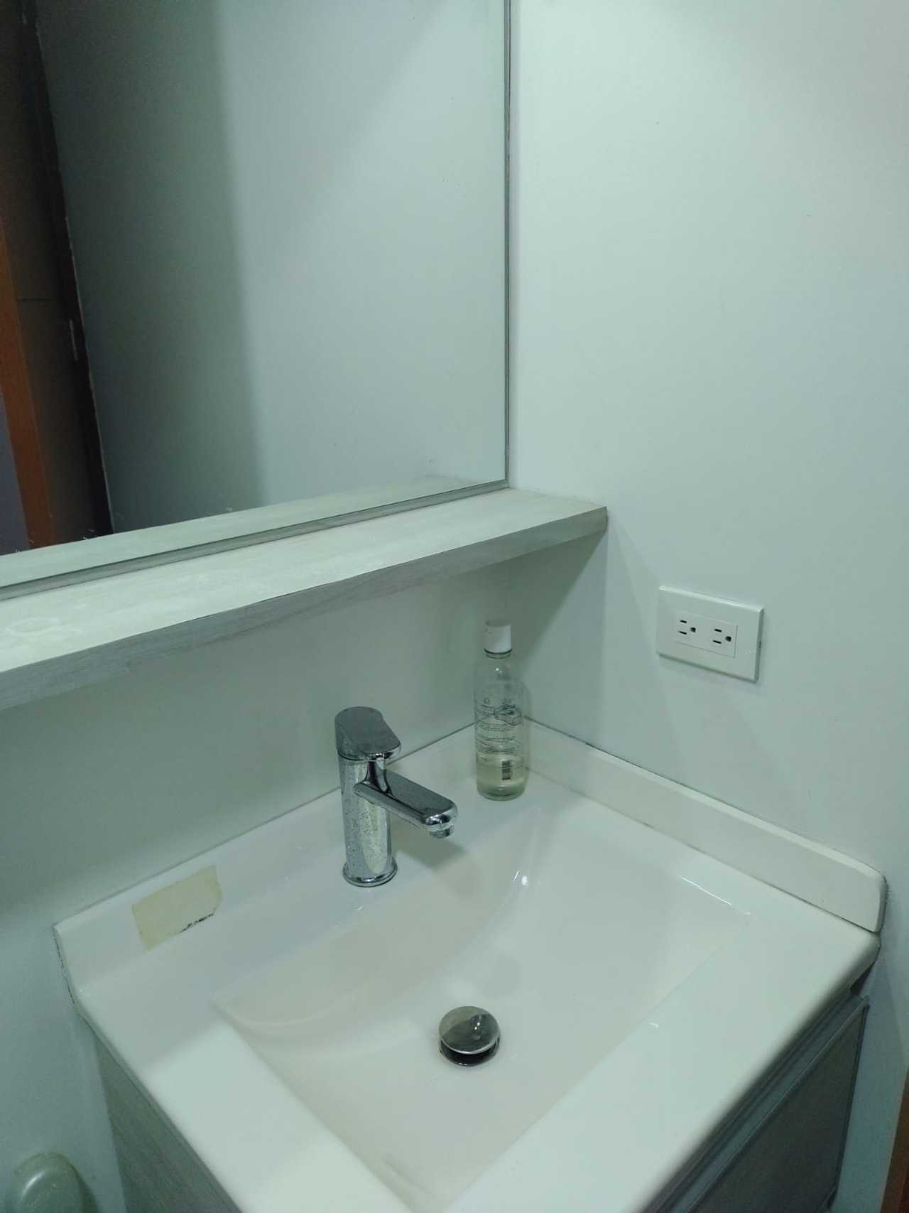 Bright room with dedicated bathroom in cozy home