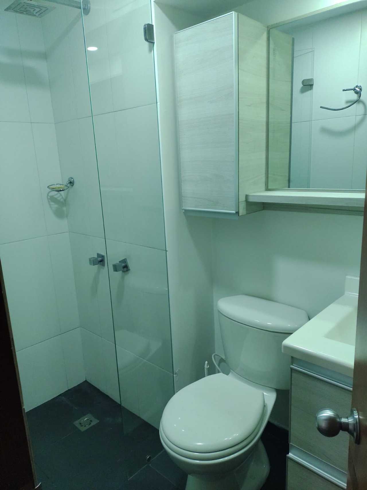 Bright room with dedicated bathroom in cozy home