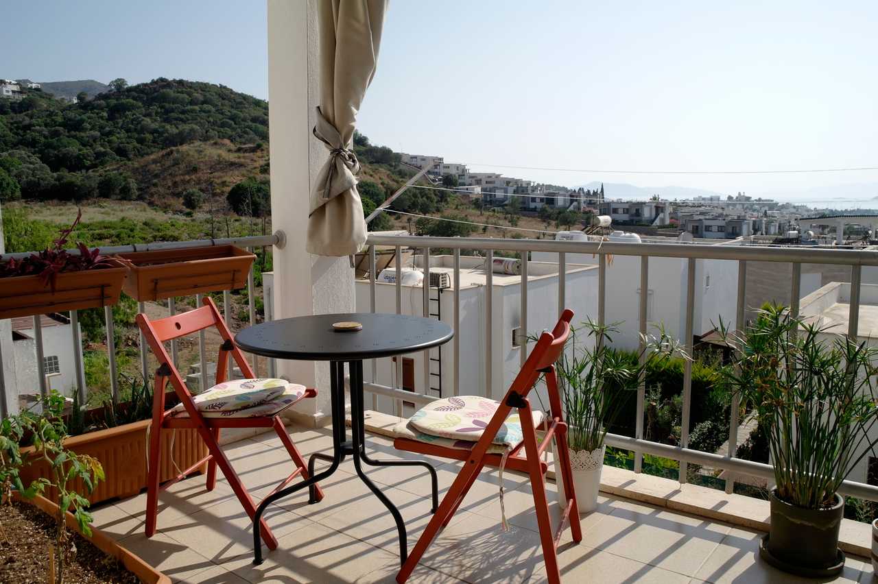 Sunny home with wide landscape