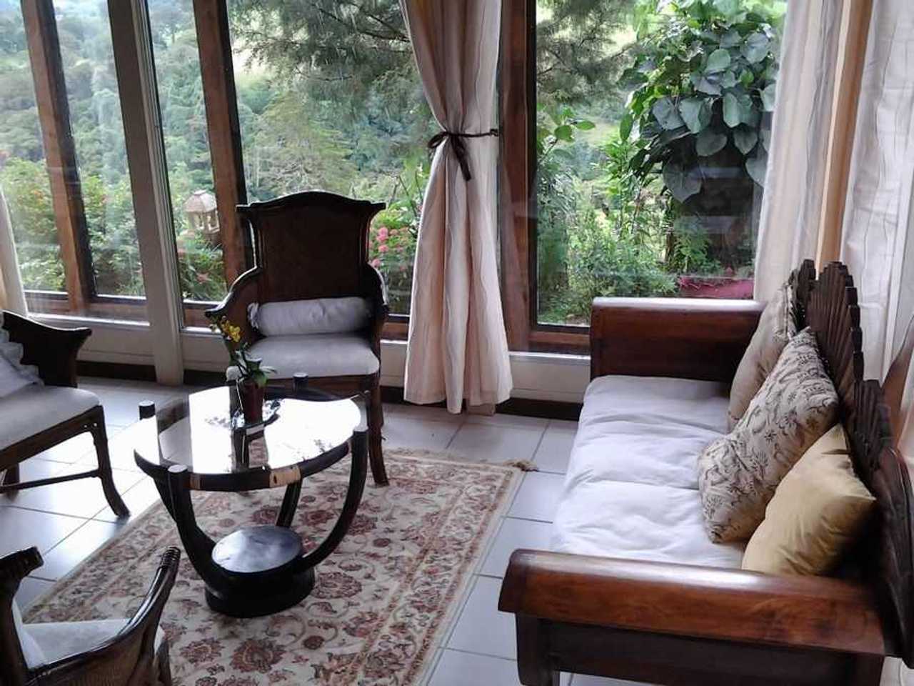 A Wood Chalet in the Mountains in Front of Poas Volcano