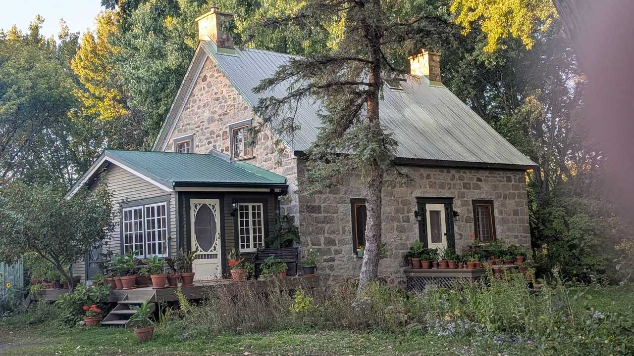 Cute old house in a forest far from road