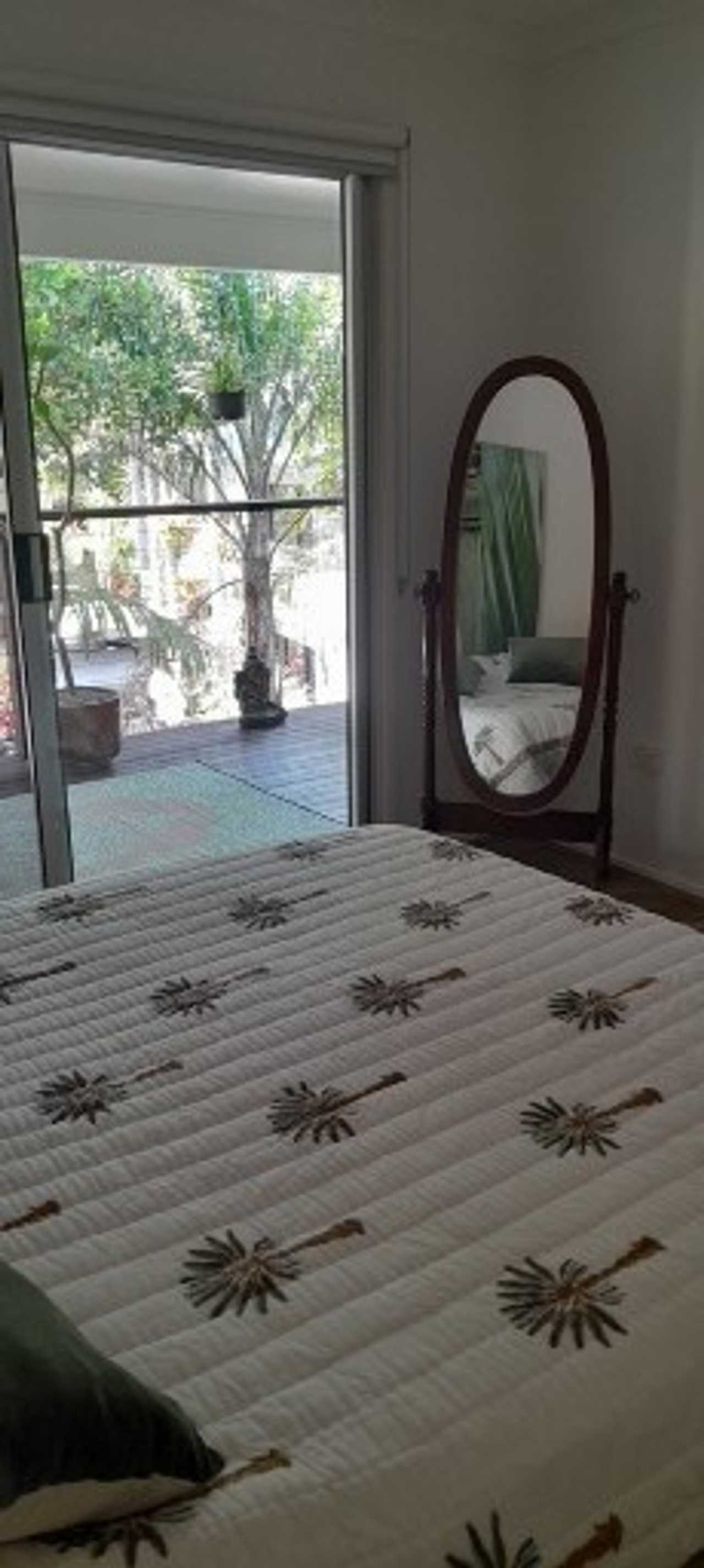 First floor room with balcony and Pacific ocean breeze in sought after location.