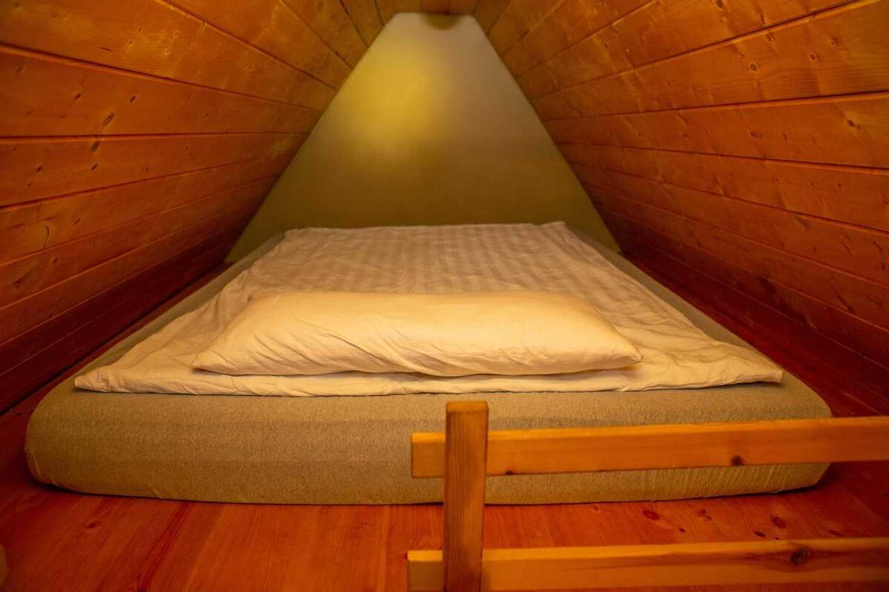 Ökohostel für Vegetarier,  wohnen mit Gleichgesinnten auf drei Ebenen.