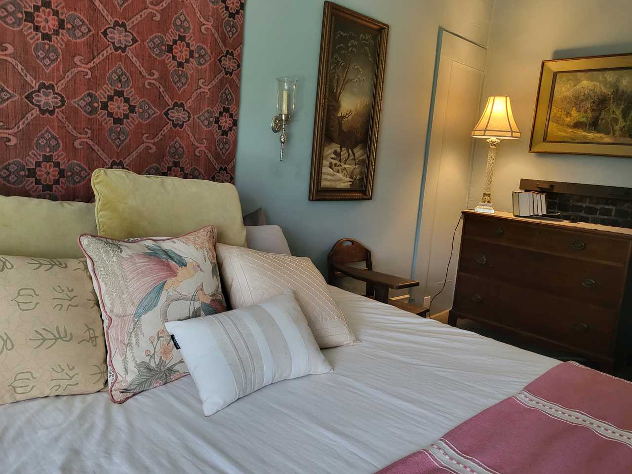 Beautiful King Bedroom with Large Gallery Wall and Art on the Ottawa River